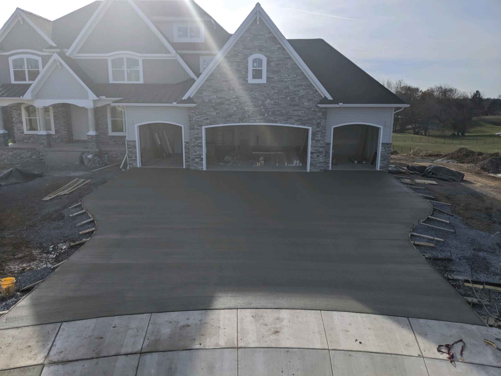 Concrete driveway and garage apron