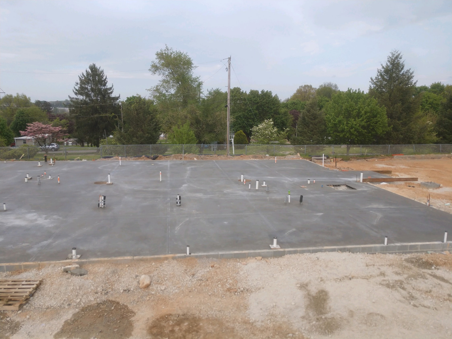 Large commercial concrete slab prepared for builders